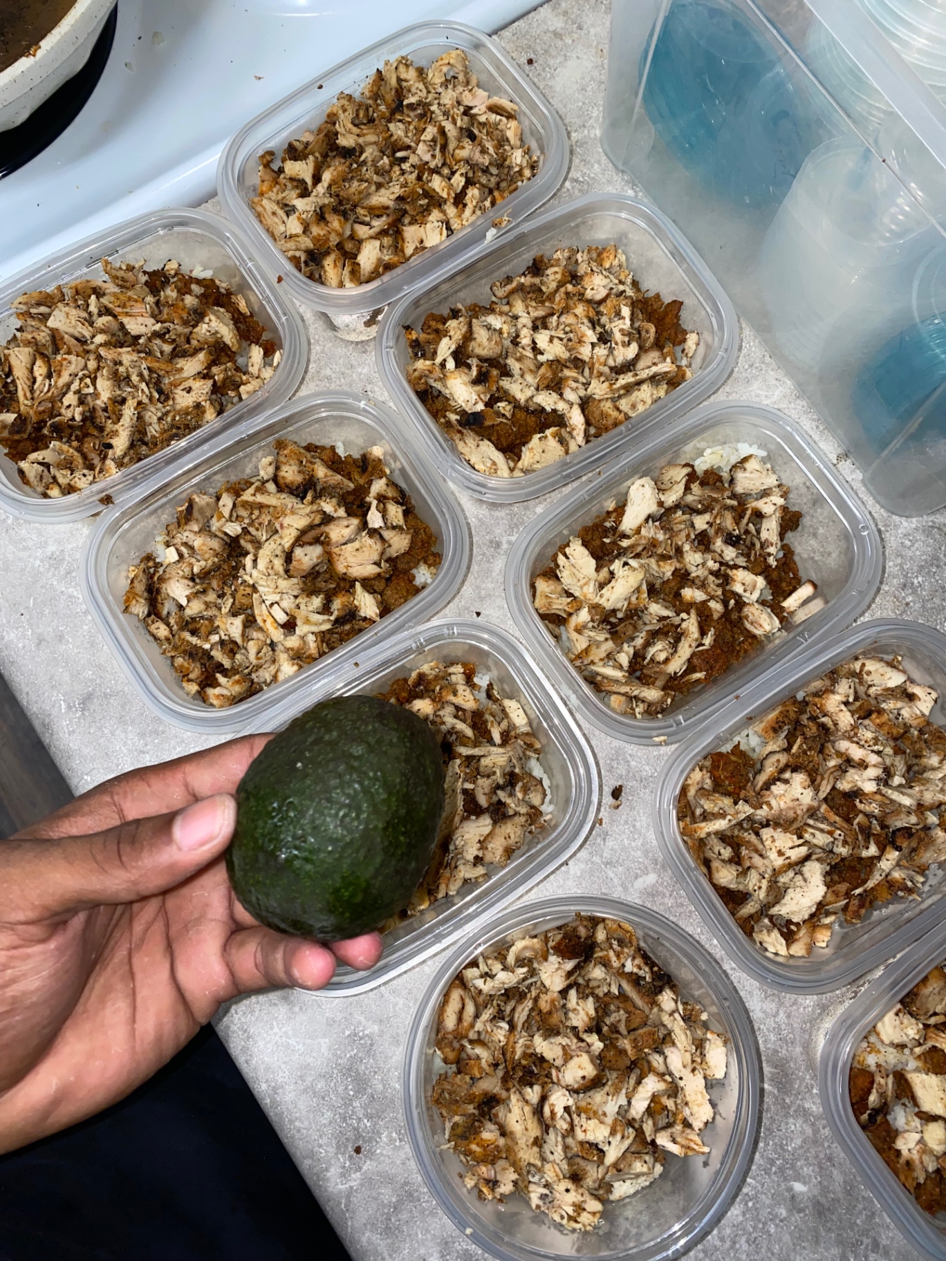 Healthy meal prep containers with protein and vegetables