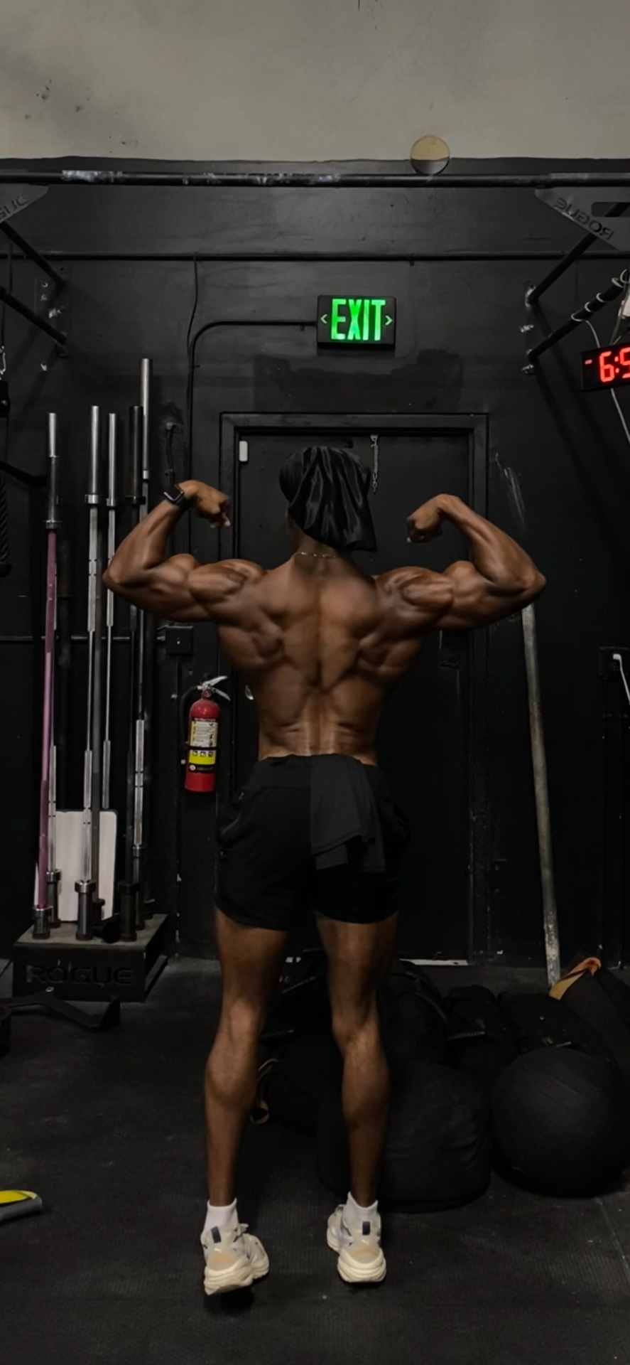 Nate hitting a back double biceps pose