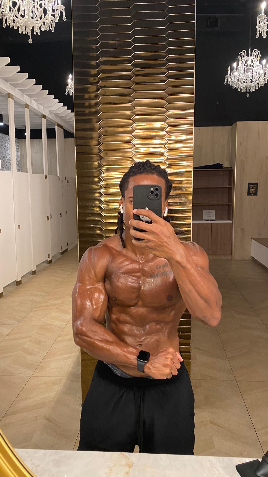 Nate showing shredded abs and conditioning